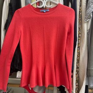 Gorgeous cashmere, coral peplum sweater.